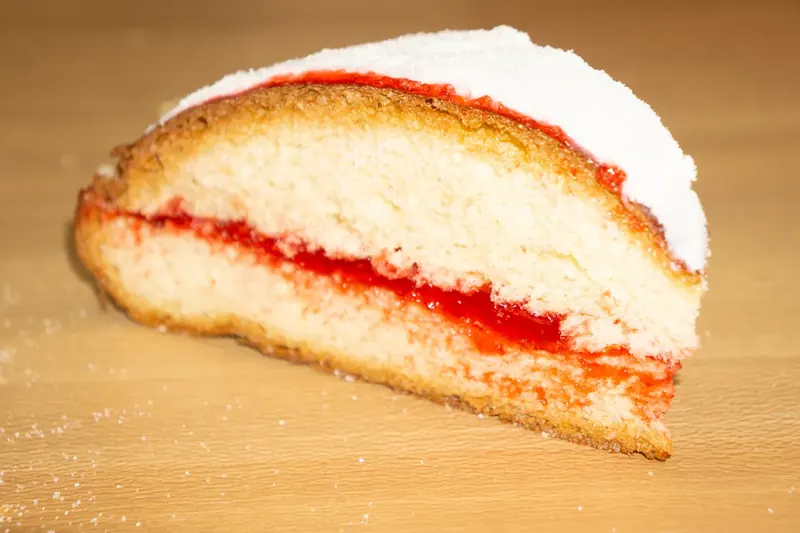 Rebanada with strawberry jam and frosting