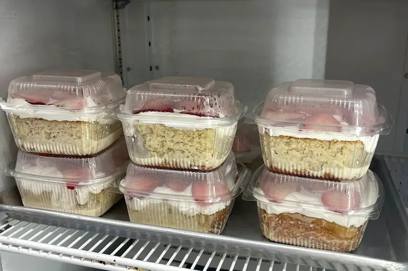 Tres leches slices in to-go containers